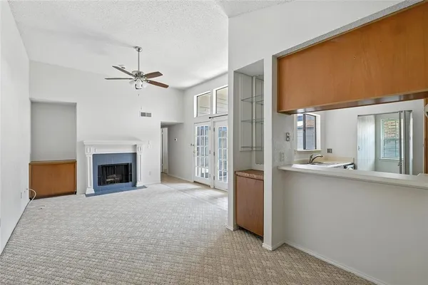 a kitchen with stainless steel appliances a stove and a microwave oven