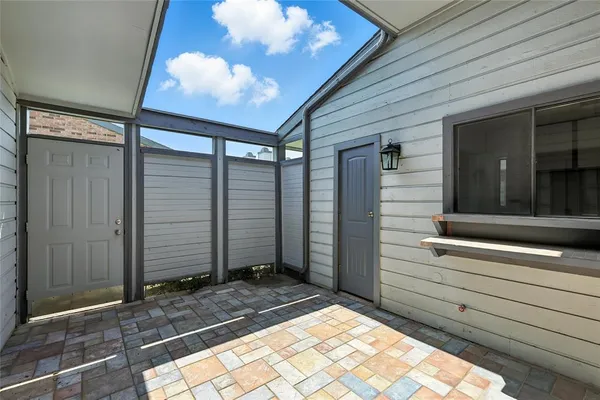 a view of house with backyard