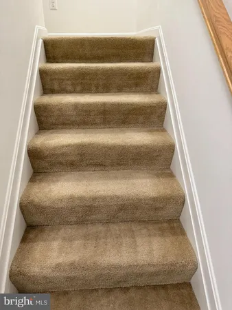 a view of hallway with closet