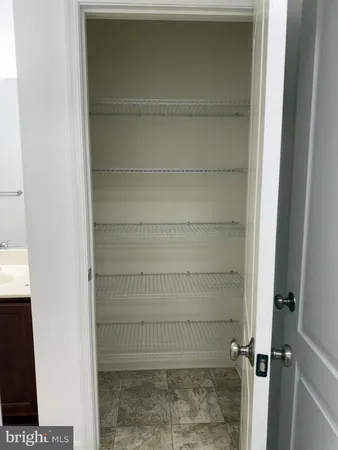 a bathroom with a bathtub and window