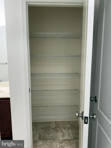 a bathroom with a bathtub and window