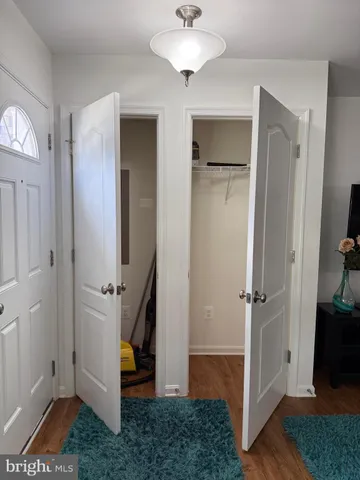 a view of entryway with bathroom