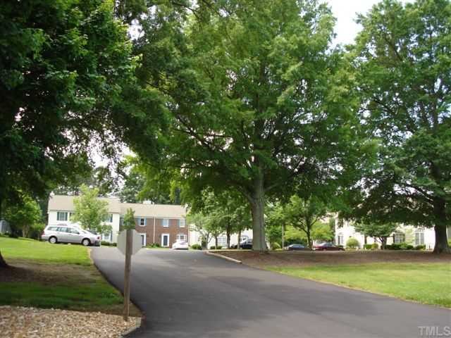 6902 Saxby Court Raleigh, NC 27613 - Photo 3 of 12 Saxby Court entrance. Large trees and common areas. Peaceful and serene Mailboxes to your left