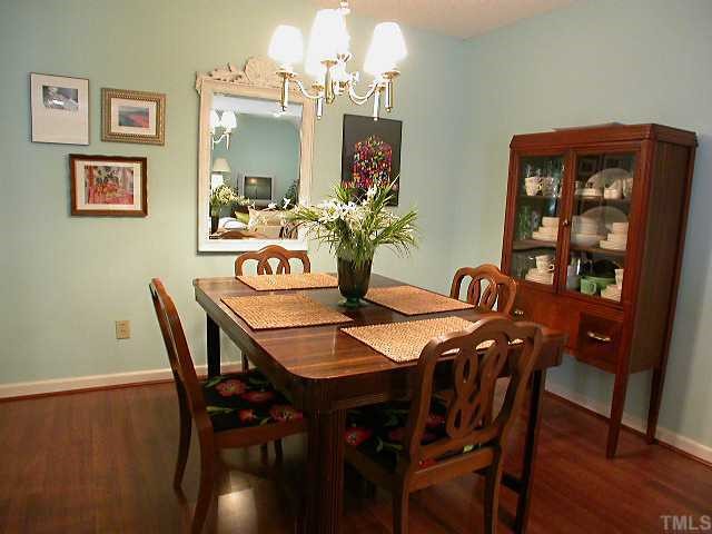 6902 Saxby Court Raleigh, NC 27613 - Photo 5 of 12 Large dining room Laminate flooring..