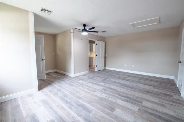 a view of storage and utility room with a window