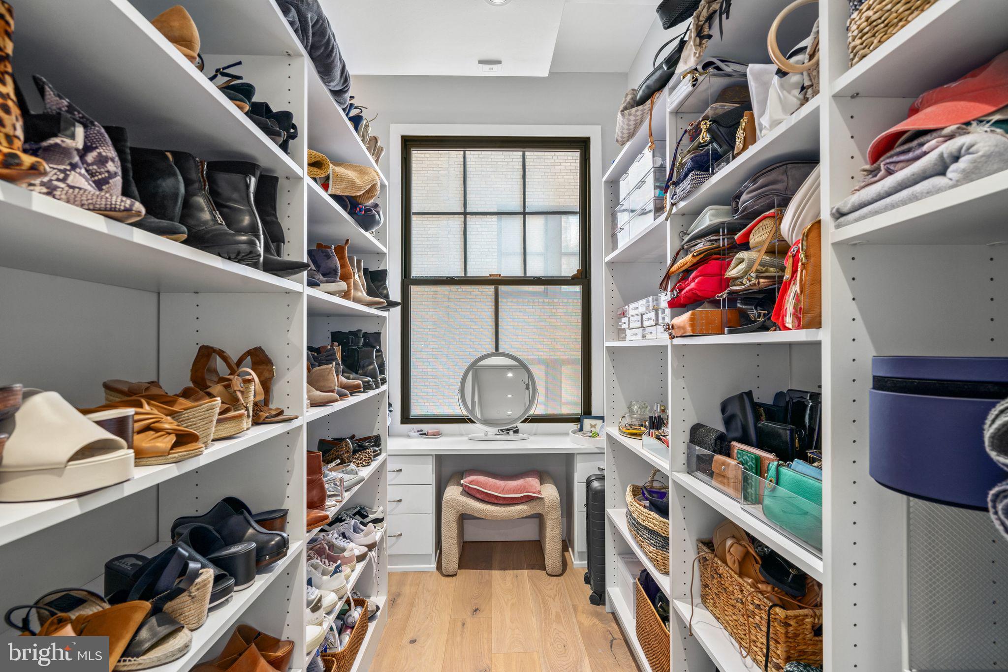 1606 Chestnut Street, Unit 4 Philadelphia, PA 19103 - Photo 15 of 35 a view of walk in closet with clothes and shoes
