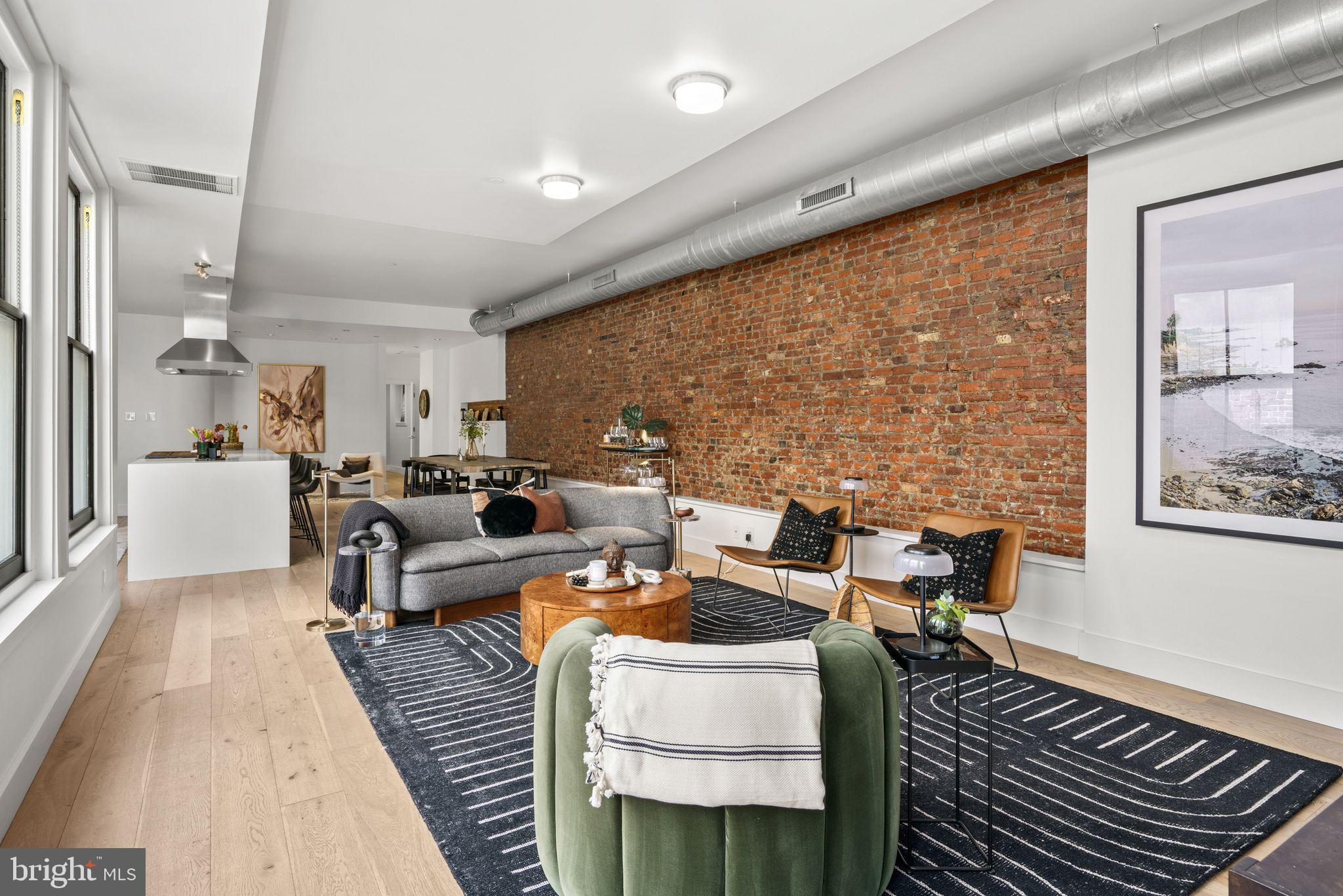1606 Chestnut Street, Unit 4 Philadelphia, PA 19103 - Photo 2 of 35 a living room with furniture