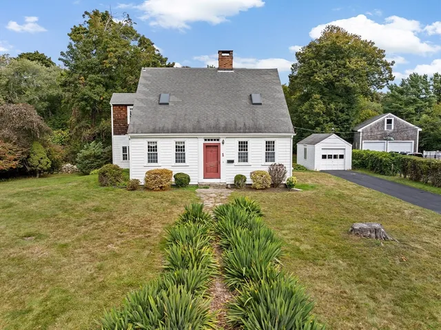a aerial view of a house with garden
