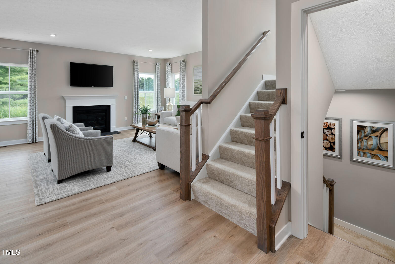 901 Walker Rdg Way Willow Spring, NC 27592 - Photo 17 of 30 a living room with furniture and a fireplace