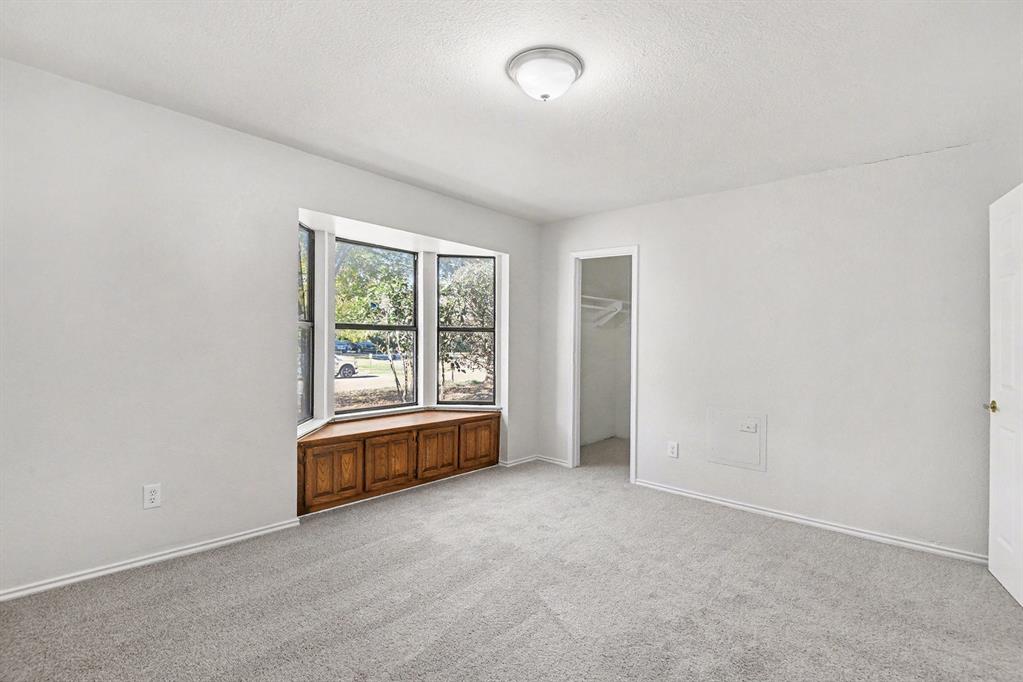 7912 Prairie Drive Watauga, TX 76148 - Photo 13 of 20 an empty room with large window