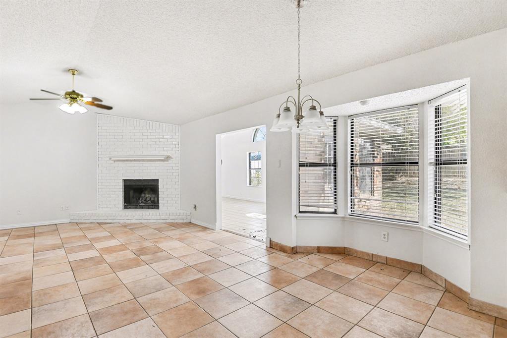 7912 Prairie Drive Watauga, TX 76148 - Photo 8 of 20 a view of an empty room with a window