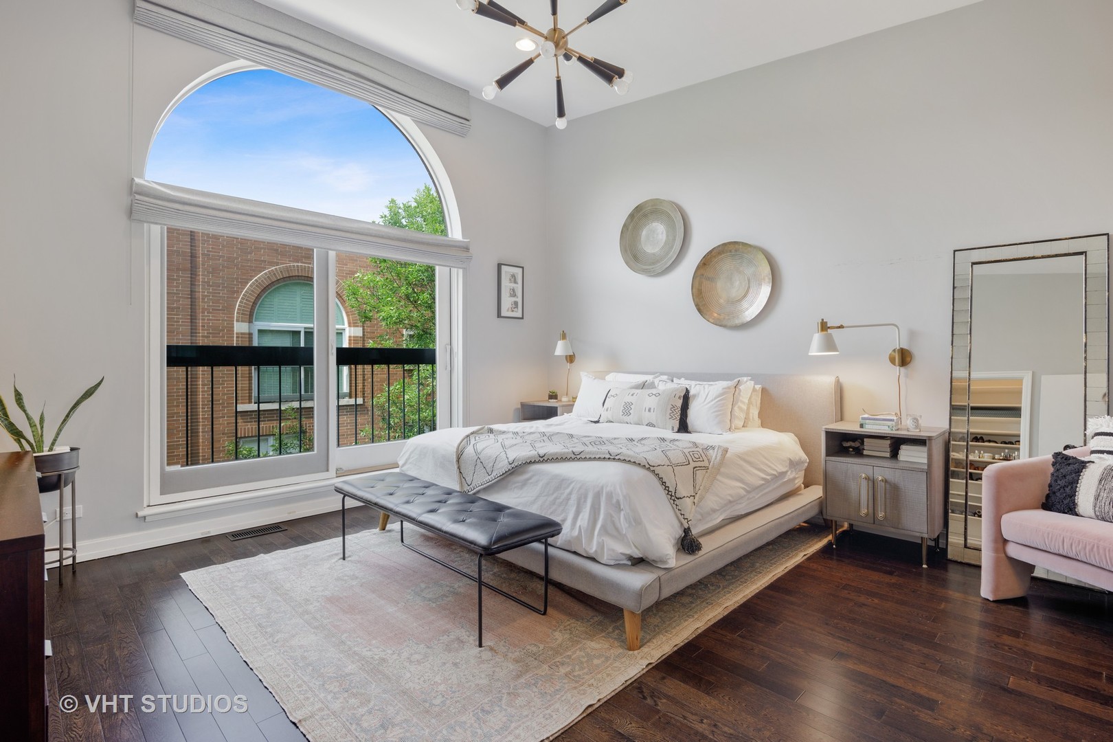2673 North Greenview Avenue, Unit F Chicago, IL 60614 - Photo 11 of 23 a bedroom with a bed mirror and a large window