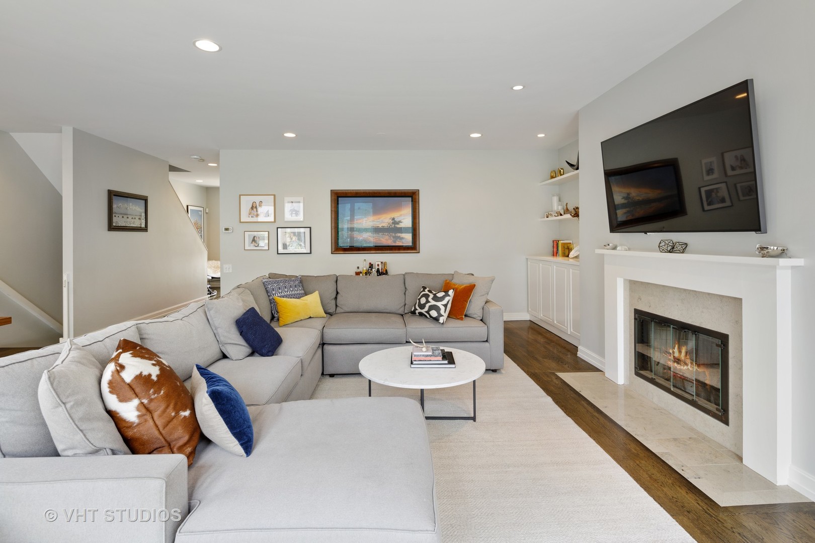 2673 North Greenview Avenue, Unit F Chicago, IL 60614 - Photo 5 of 23 a living room with furniture a flat screen tv and a fireplace