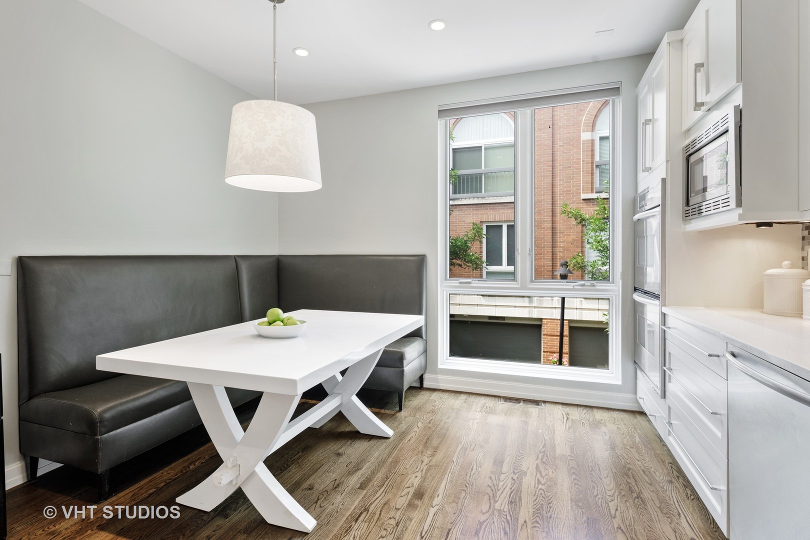 2673 North Greenview Avenue, Unit F Chicago, IL 60614 - Photo 10 of 23 a view of a dining room with furniture window and wooden floor