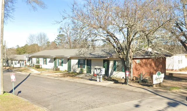 a front view of a building with street view