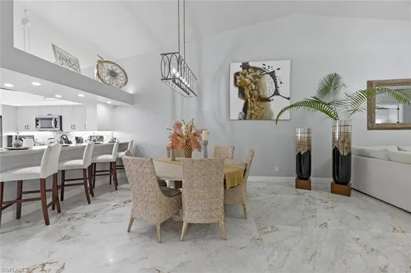 a view of a dining room with furniture