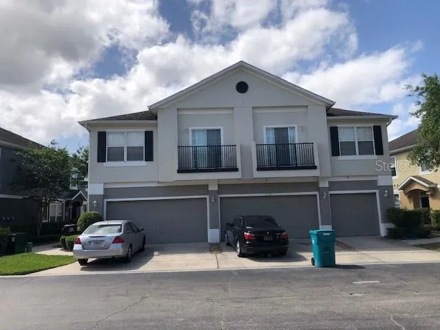 a car parked in front of a house