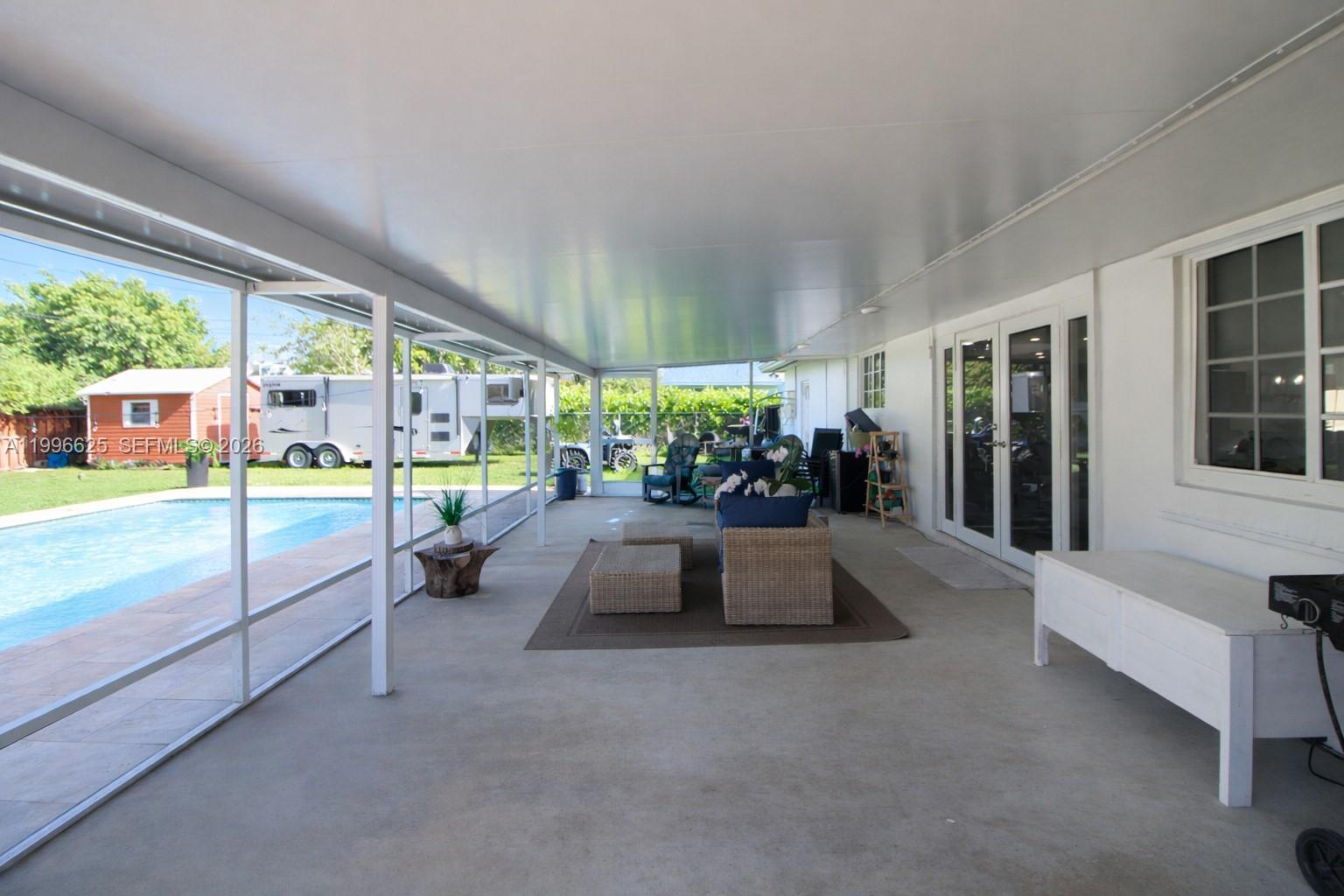 27420 Southwest 165th Avenue Homestead, FL 33031 - Photo 22 of 35 a view of a living room and entry way