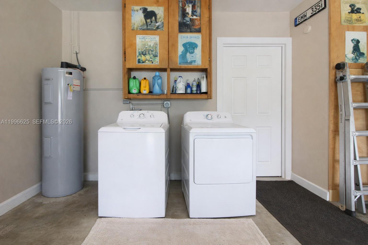 27420 Southwest 165th Avenue Homestead, FL 33031 - Photo 35 of 35 a utility room with dryer and washer