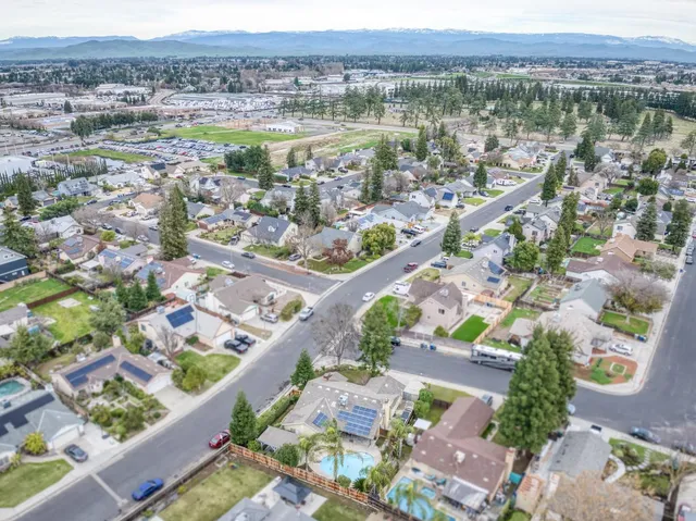 an aerial view of residential building and lake view