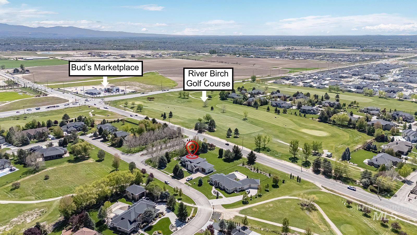 8751 West Rioja Street Star, ID 83669 - Photo 30 of 34 Aerial perspective highlighting a residential area with proximity to a golf course and commercial amenities