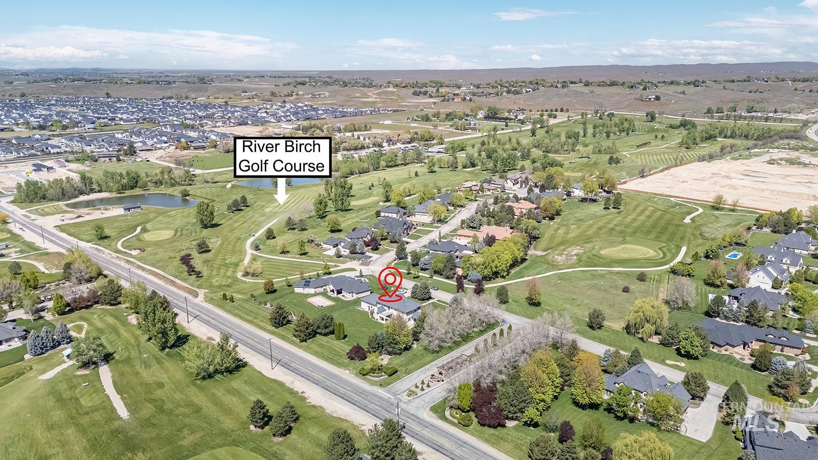 8751 West Rioja Street Star, ID 83669 - Photo 31 of 34 Aerial perspective showcasing a residential property with surrounding green spaces