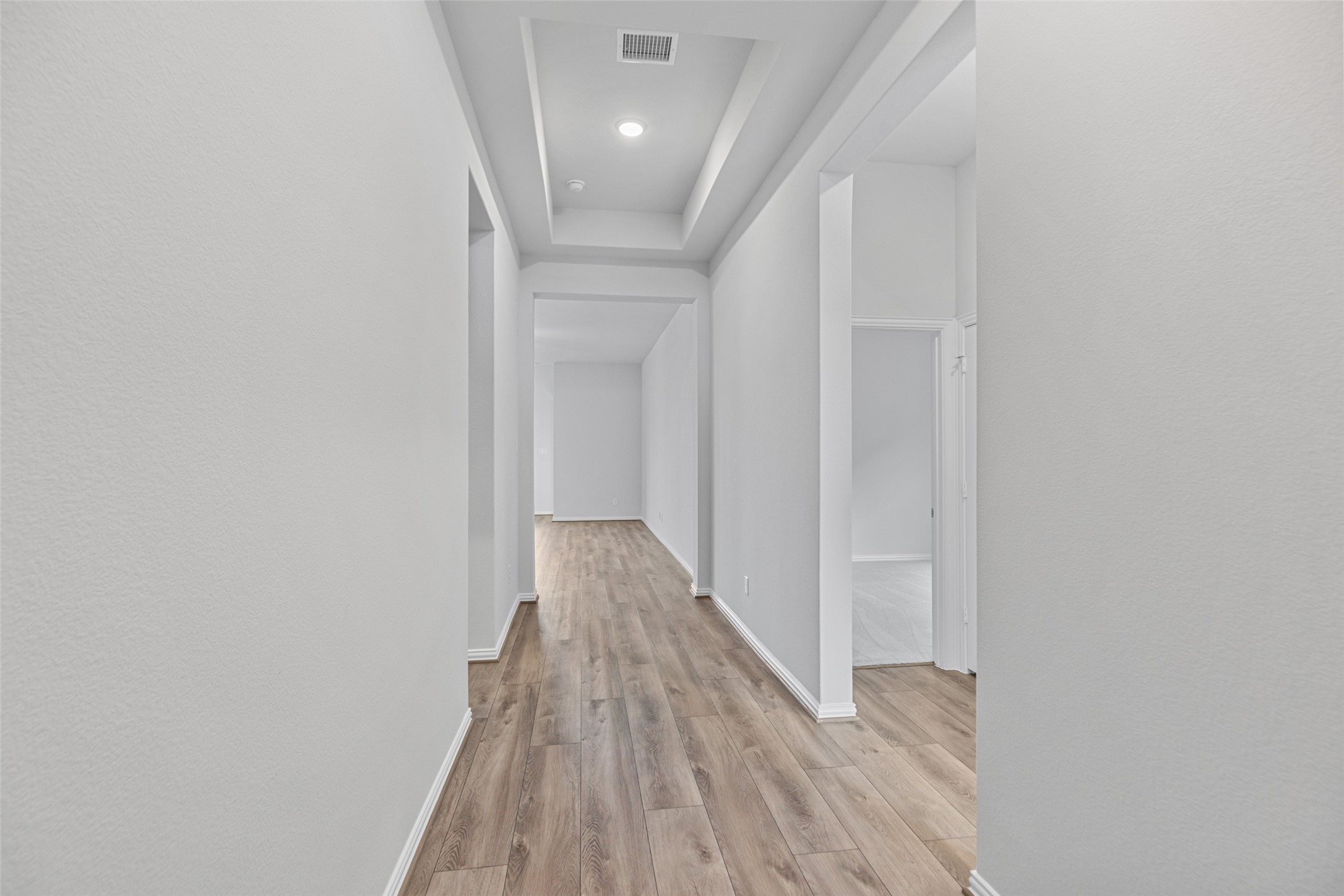 803 Evergreen Frst Lane Rosharon, TX 77583 - Photo 3 of 31 a view of hallway with wooden floor