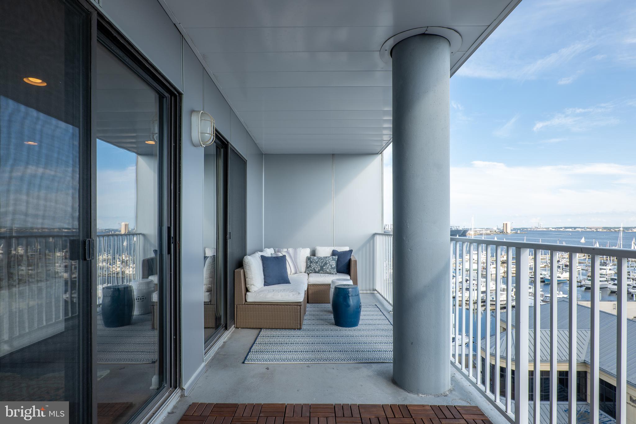 2702 Lighthouse Point East, Unit 637 Baltimore, MD 21224 - Photo 28 of 37 a view of a living room and bathroom