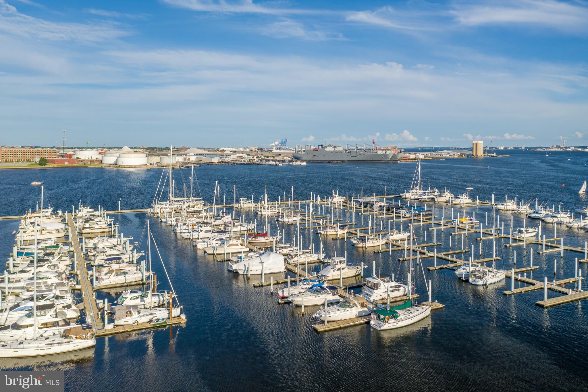 2702 Lighthouse Point East, Unit 637 Baltimore, MD 21224 - Photo 32 of 37 a view of a workspace with wooden floor