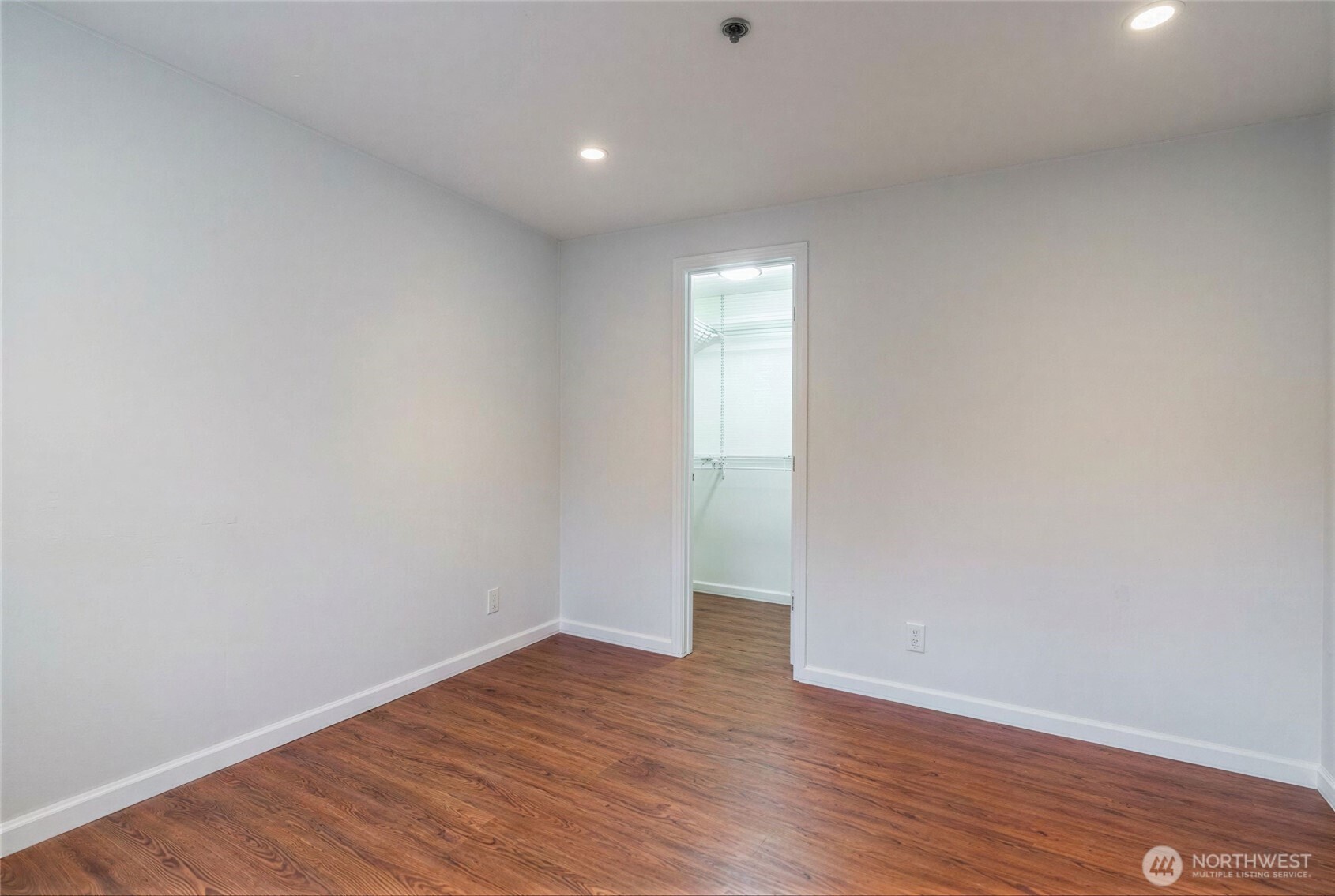 975 Aberdeen Avenue Northeast, Unit F207 Renton, WA 98056 - Photo 17 of 24 a view of an empty room with wooden floor