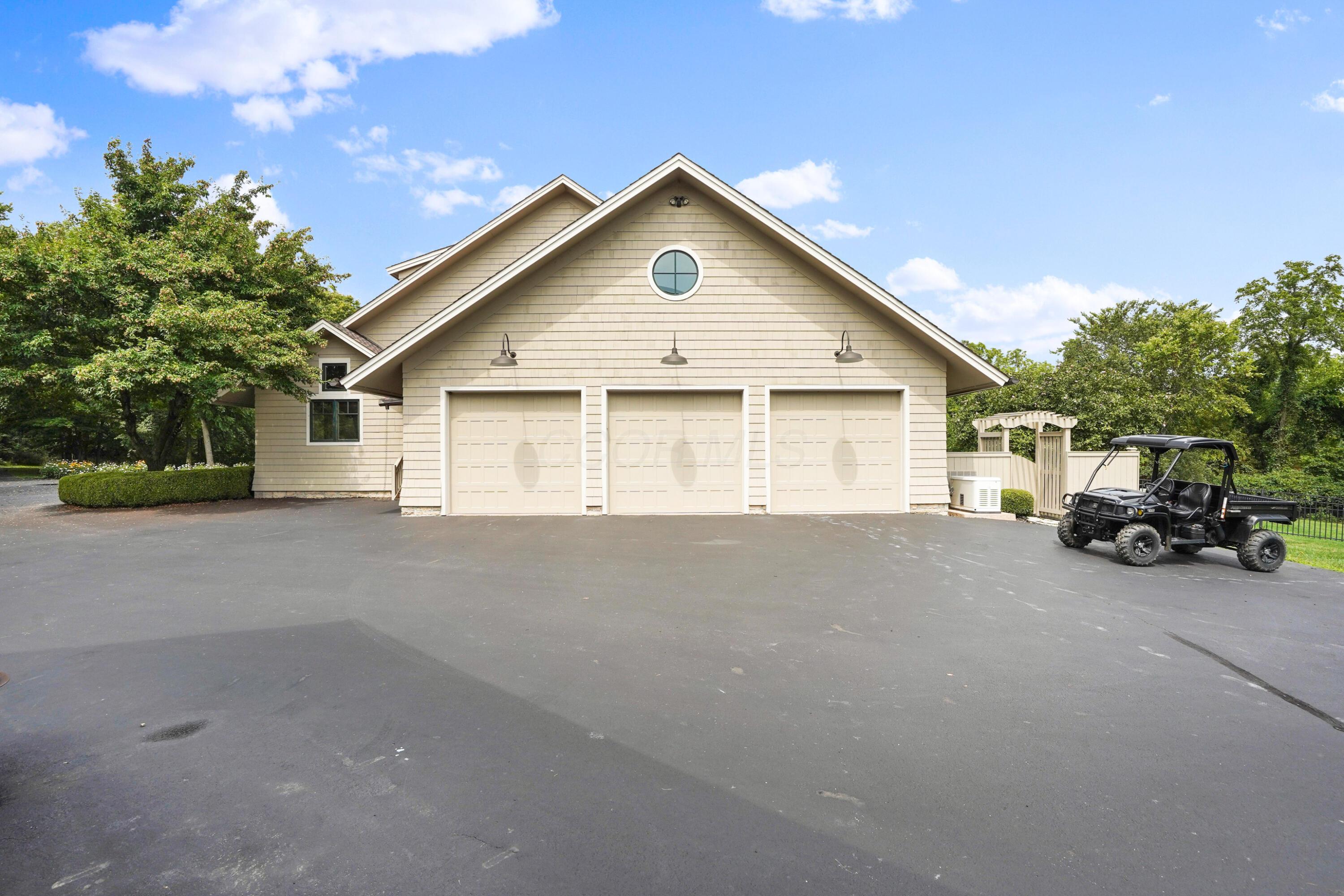 8108 Harriott Road Dublin, OH 43017 - Photo 10 of 71 3 CAR ATTACHED GARAGE