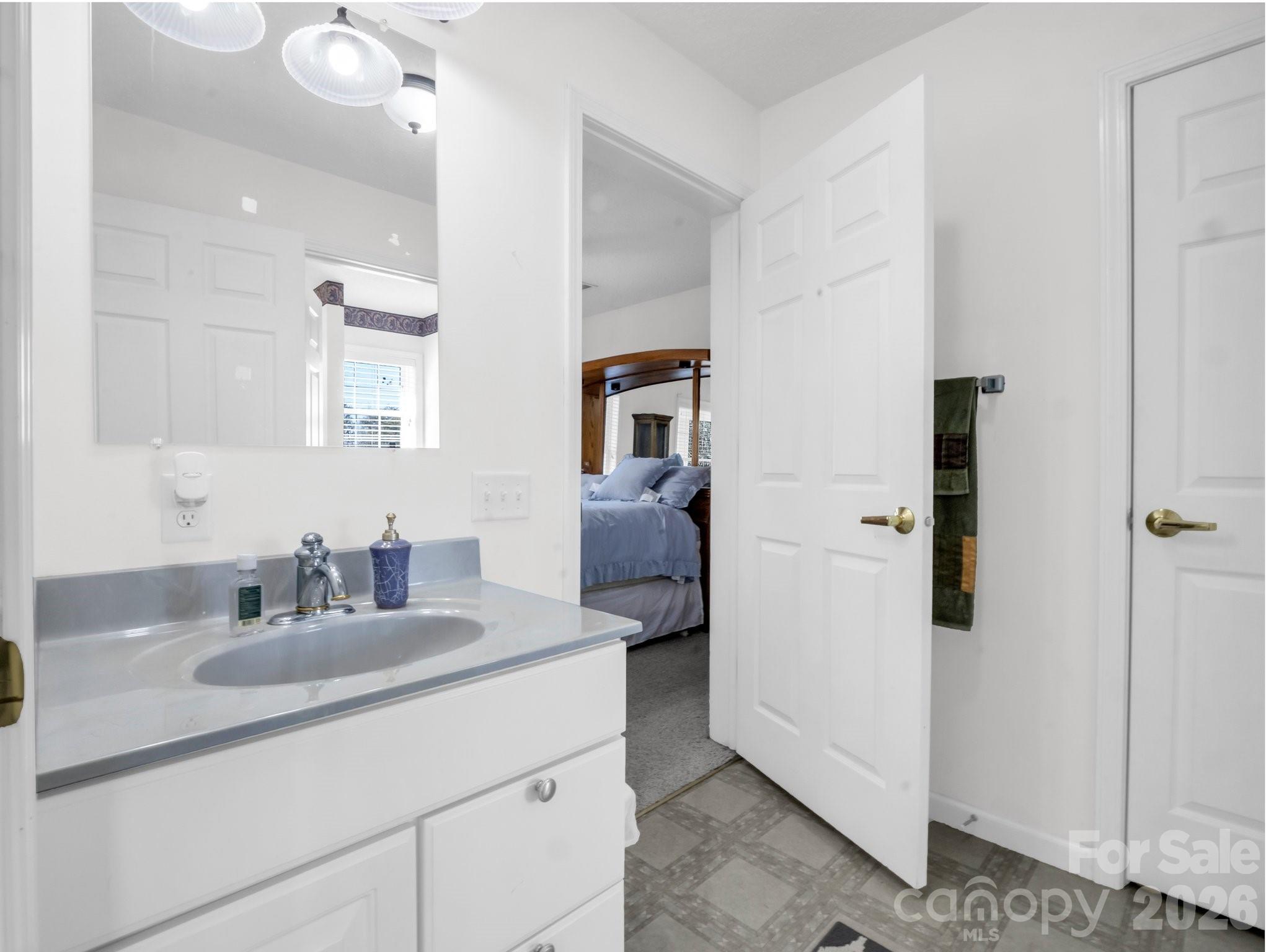 532 Harvey Logan Road Bostic, NC 28018 - Photo 41 of 48 a bathroom with a sink and a mirror