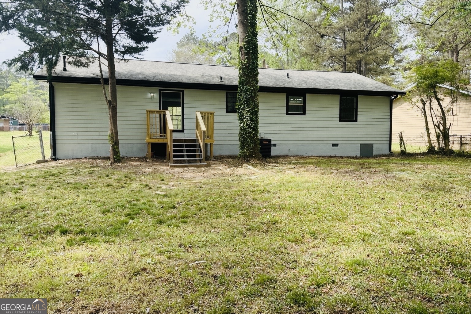 70 Darwin Drive Jonesboro, GA 30238 - Photo 18 of 19 a view of a house with backyard