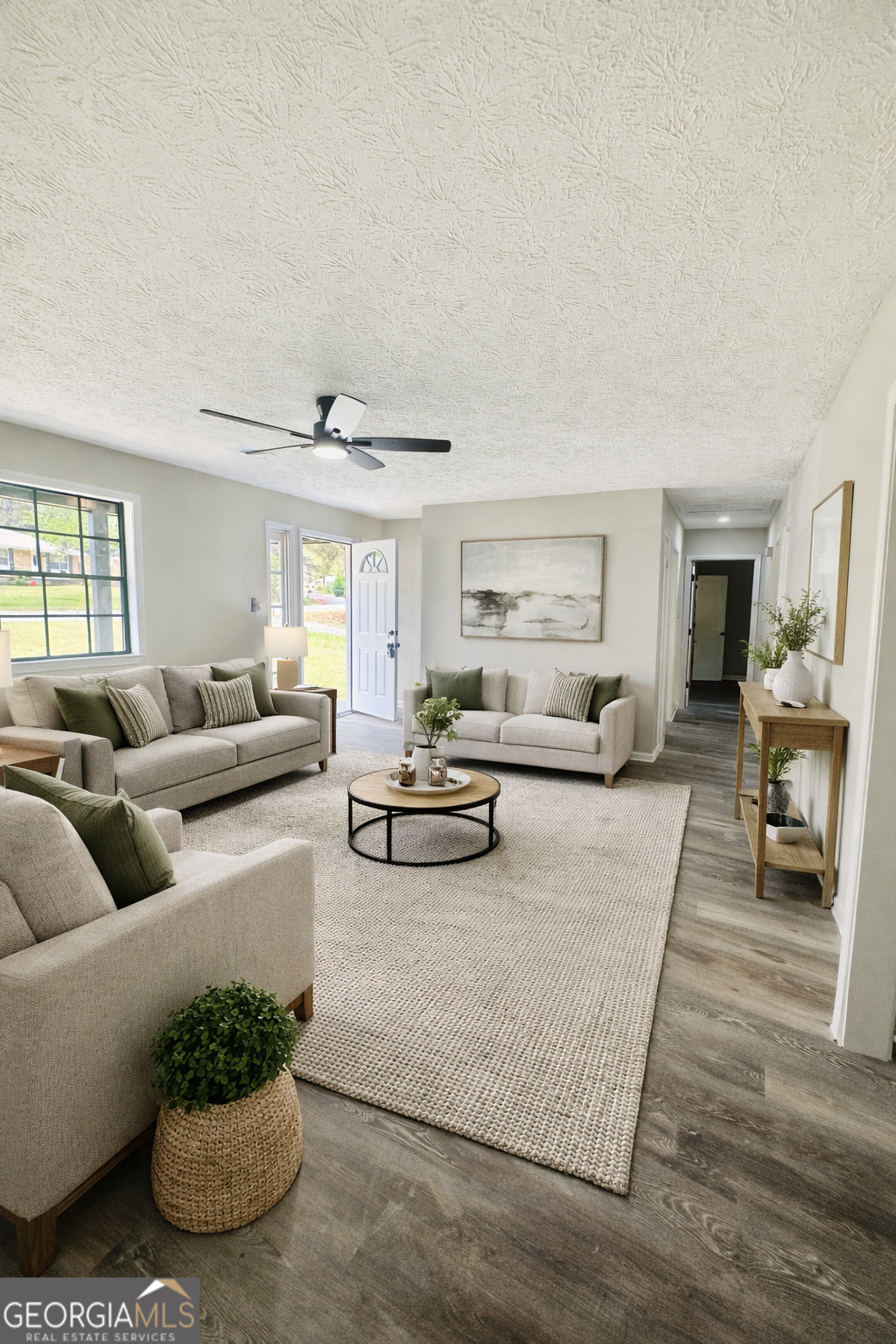 70 Darwin Drive Jonesboro, GA 30238 - Photo 4 of 19 a living room with furniture and a couch