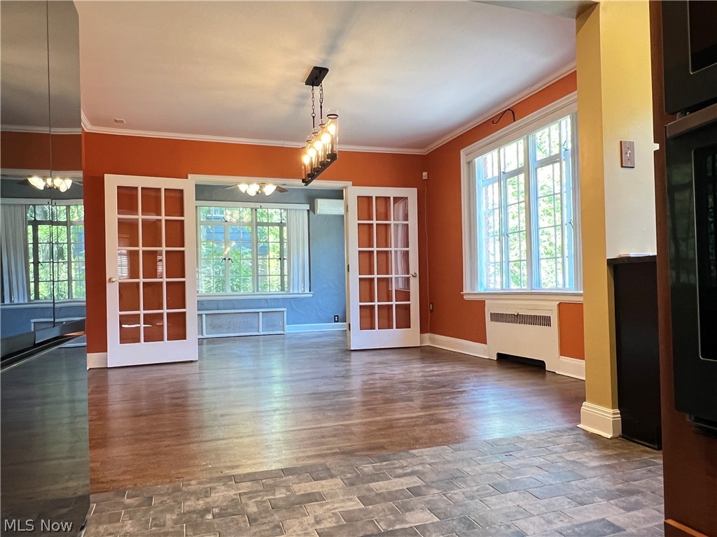 16287 Brewster Road Cleveland, OH 44112 - Photo 26 of 47 Dining area and sunroom from kitchen
