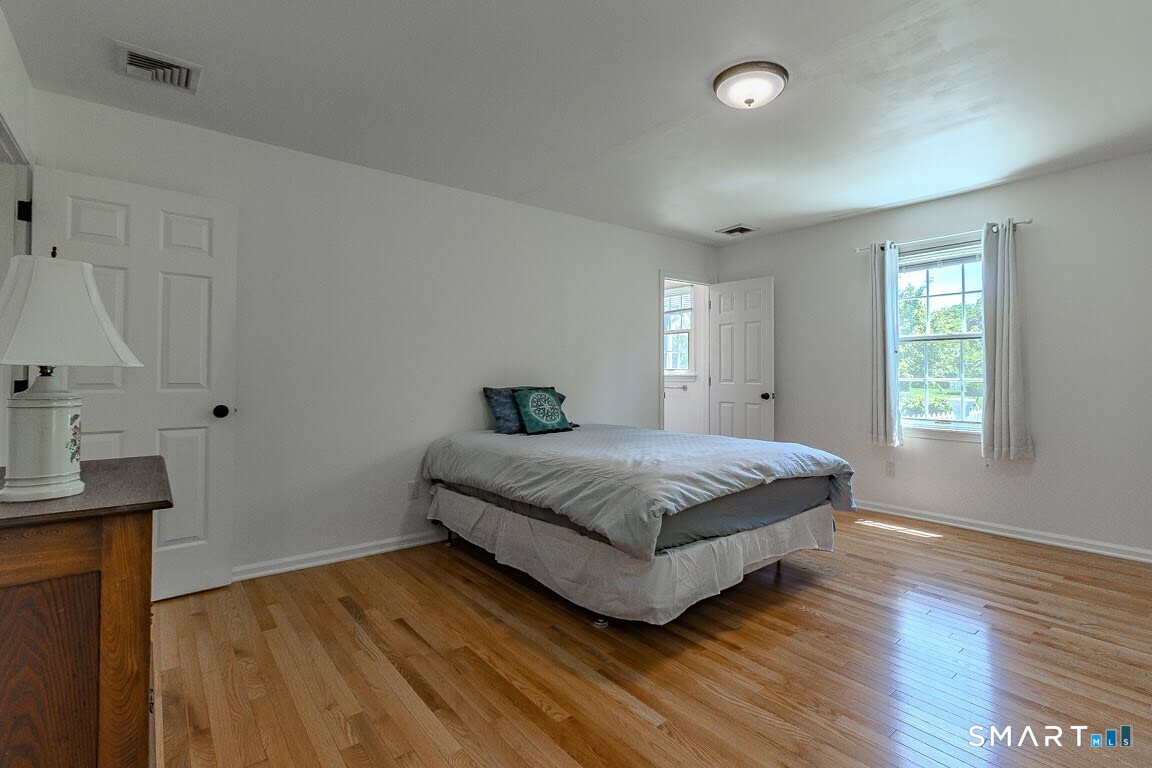 5 Thelbridge Street, Unit 5 Madison, CT 06443 - Photo 17 of 37 Primary Bedroom