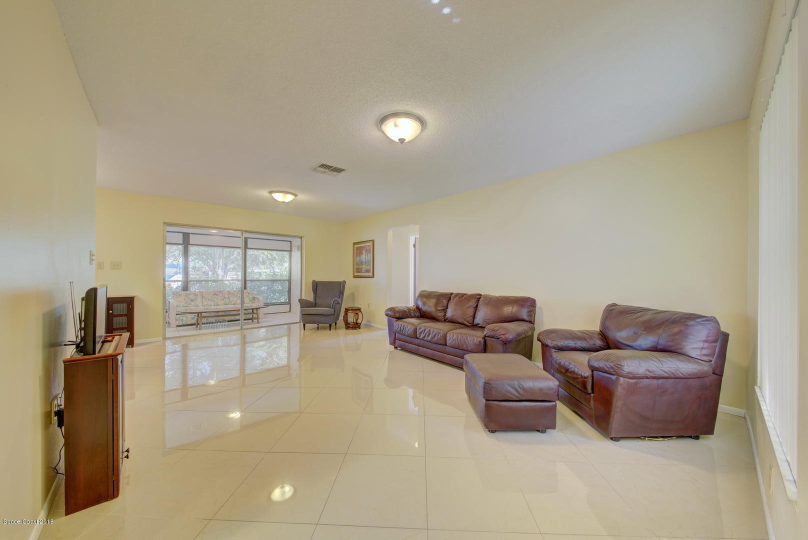1005 Audubon Road Merritt Island, FL 32953 - Photo 14 of 39 a living room with furniture