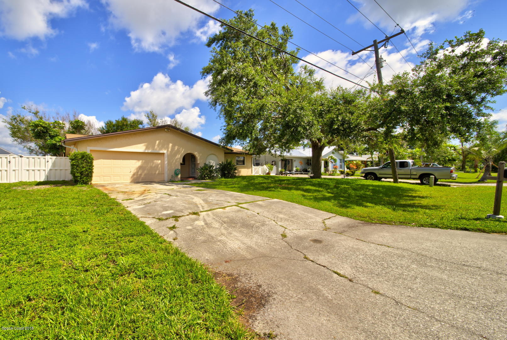 1005 Audubon Road Merritt Island, FL 32953 - Photo 32 of 39 a front view of a house with garden