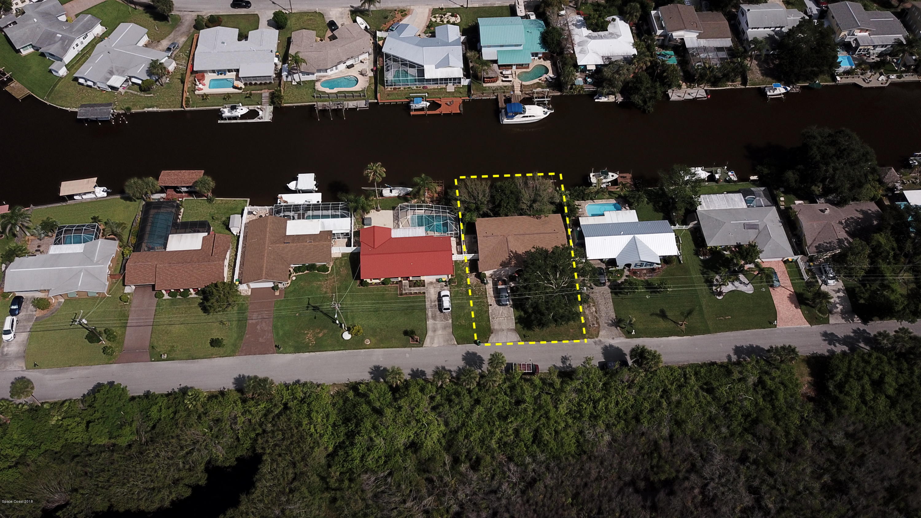 1005 Audubon Road Merritt Island, FL 32953 - Photo 38 of 39 an aerial view of residential houses with outdoor space