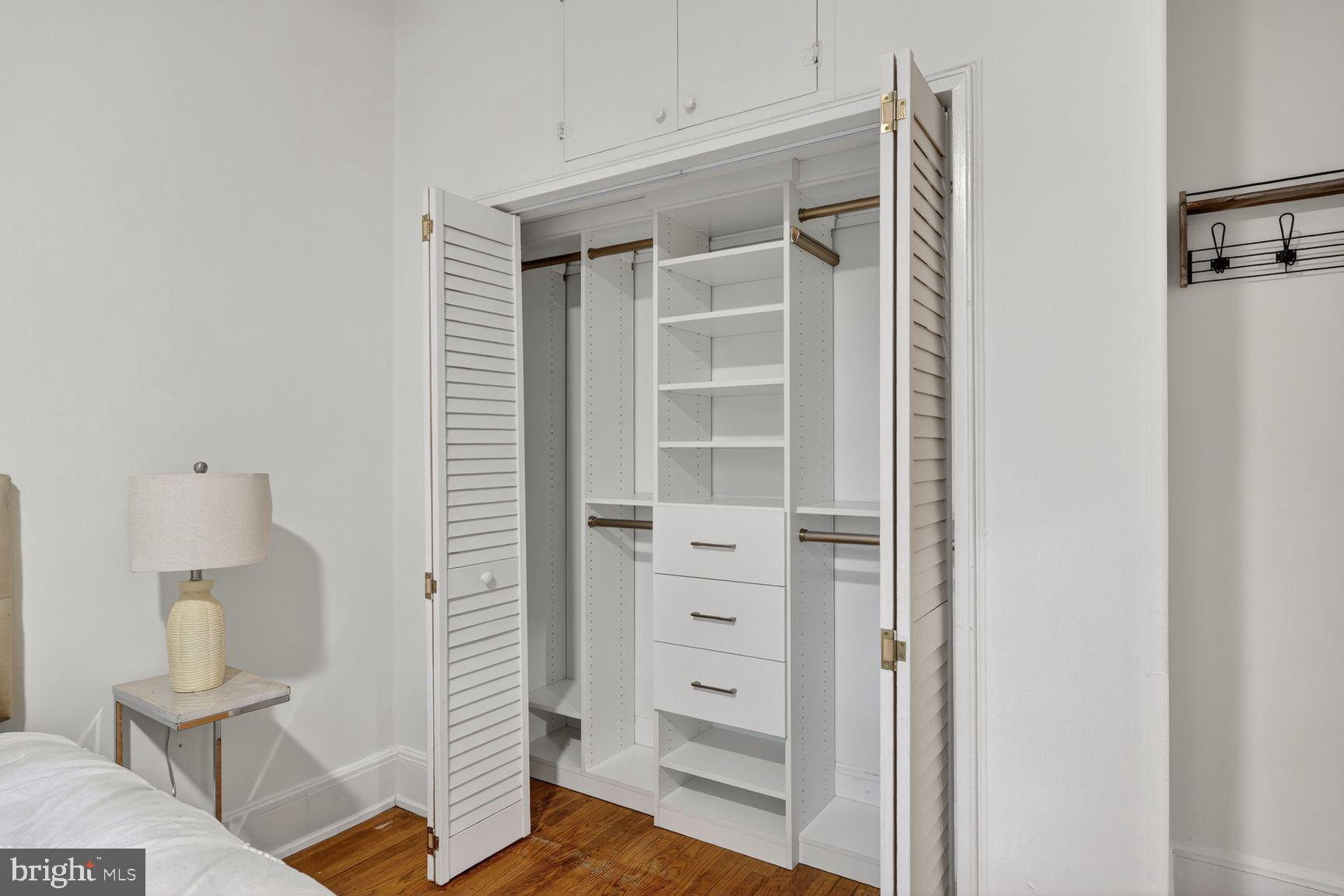 3039 Macomb Street Northwest, Unit 16 Washington, DC 20008 - Photo 15 of 17 a view of walk in closet with empty racks