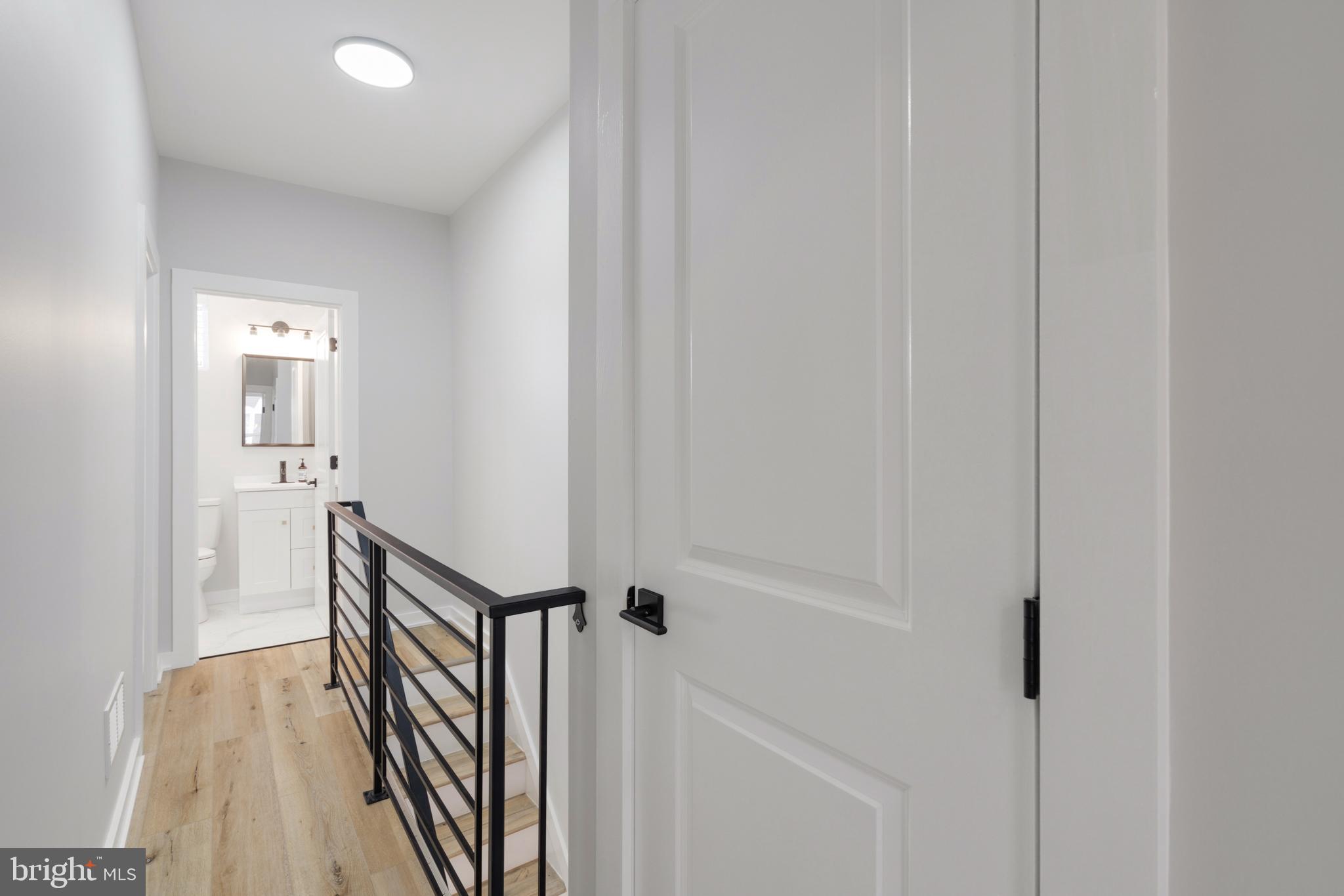 1424 North Dover Street Philadelphia, PA 19121 - Photo 18 of 23 Modern hallway with sleek design elements.