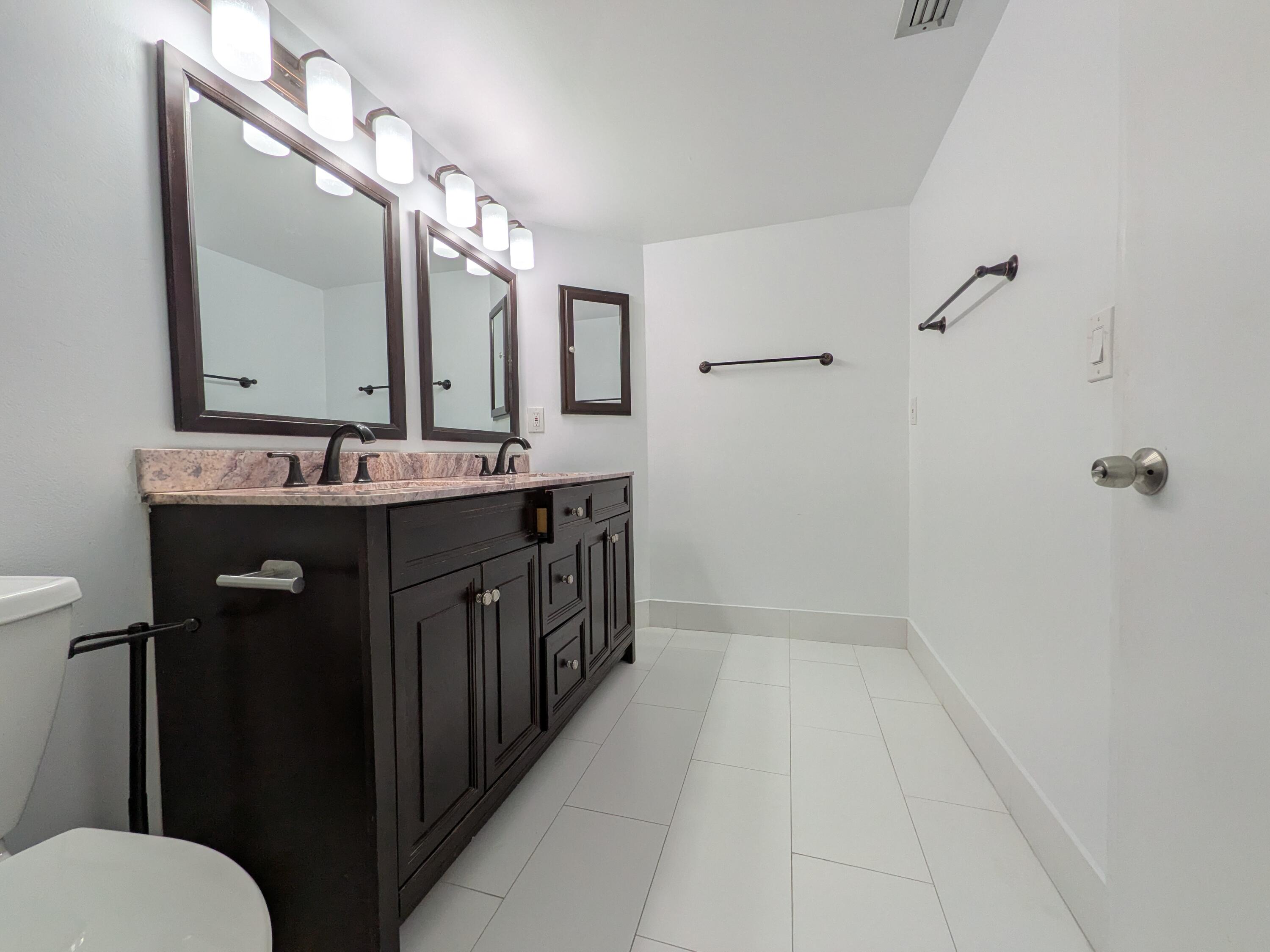 9975 Boca Gardens Trail, Unit A Boca Raton, FL 33496 - Photo 12 of 21 Primary bath