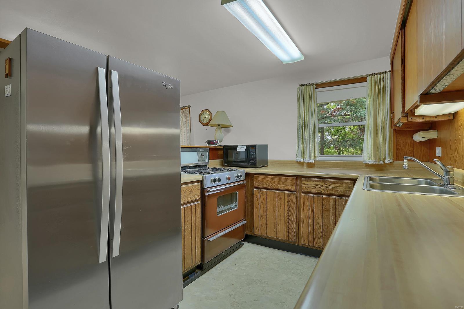 7017 Howdershell Road Hazelwood, MO 63042 - Photo 6 of 34 Gallery Image 6