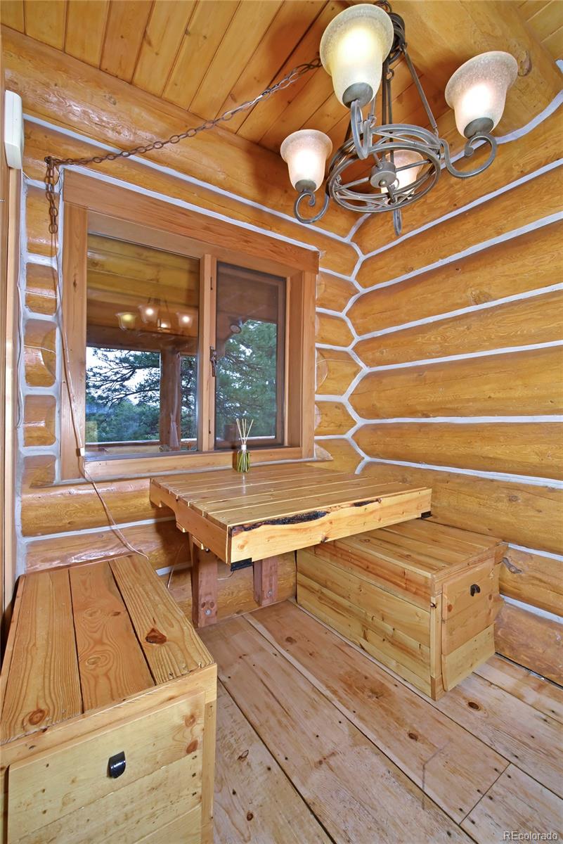 79 Buggy Whip Road Bailey, CO 80421 - Photo 13 of 39 a view of a room with gym equipment