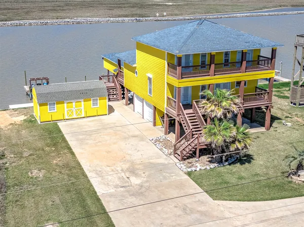 a front view of a house with swimming pool