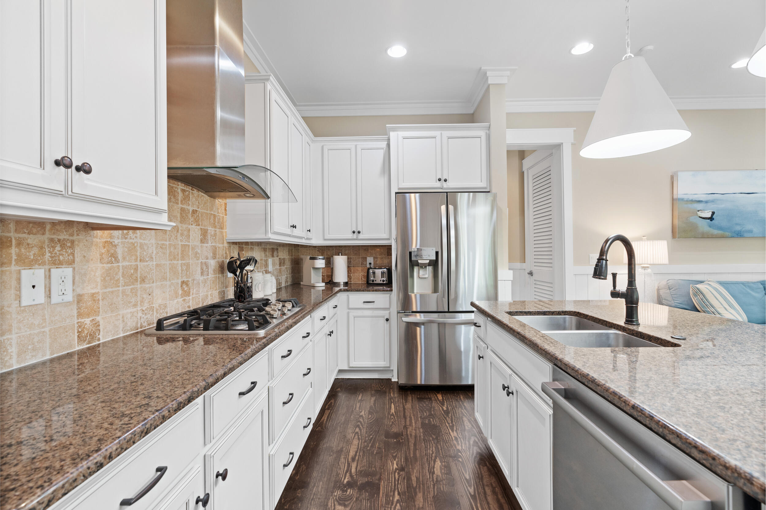 694 Flatwoods Forest Loop Santa Rosa Beach, FL 32459 - Photo 12 of 50 a kitchen with stainless steel appliances granite countertop a sink stove and refrigerator