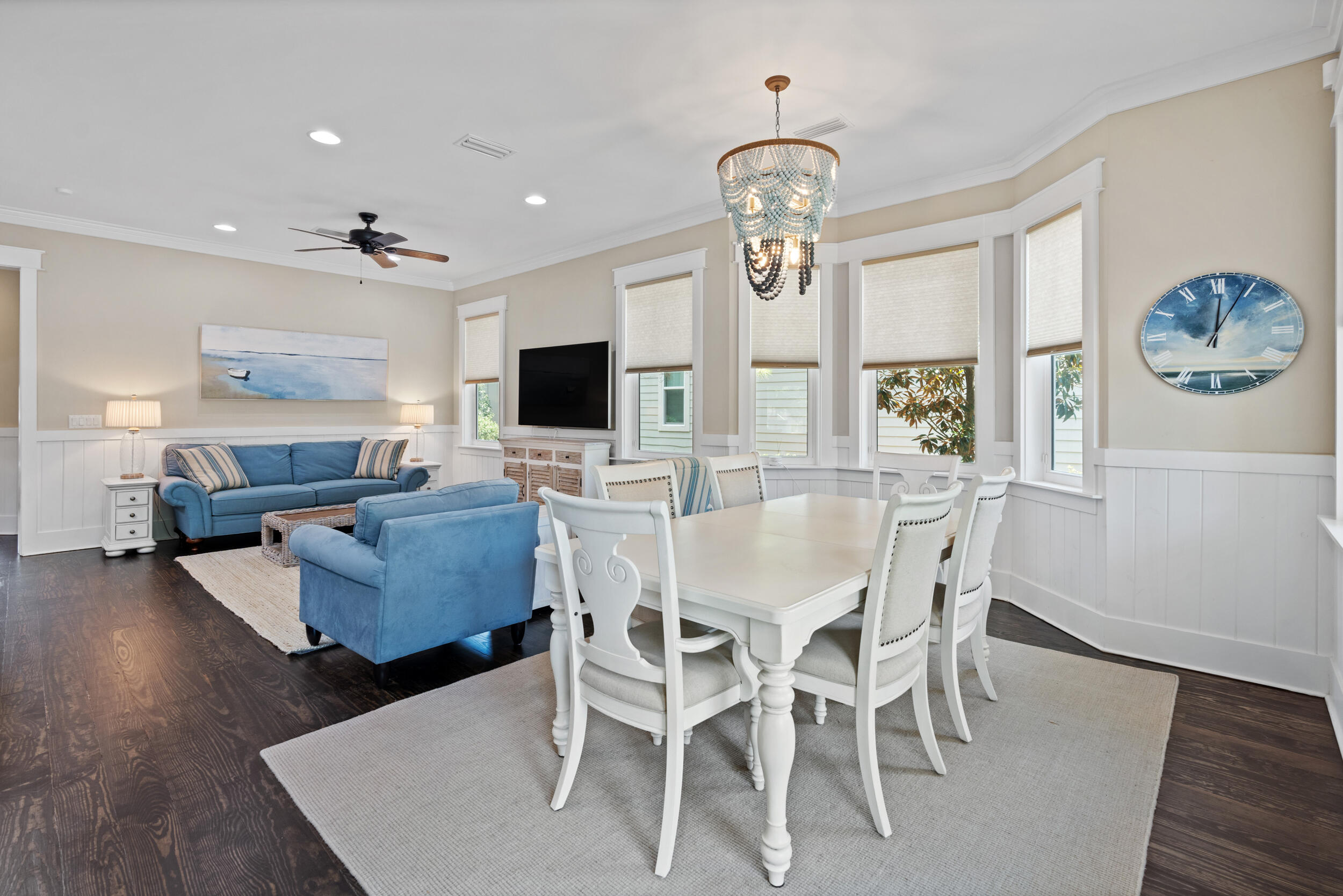 694 Flatwoods Forest Loop Santa Rosa Beach, FL 32459 - Photo 13 of 50 a view of a dining room with furniture a chandelier and wooden floor