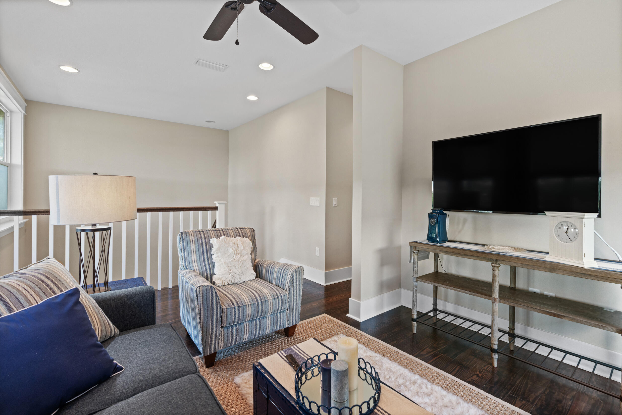694 Flatwoods Forest Loop Santa Rosa Beach, FL 32459 - Photo 23 of 50 a living room with furniture and a flat screen tv