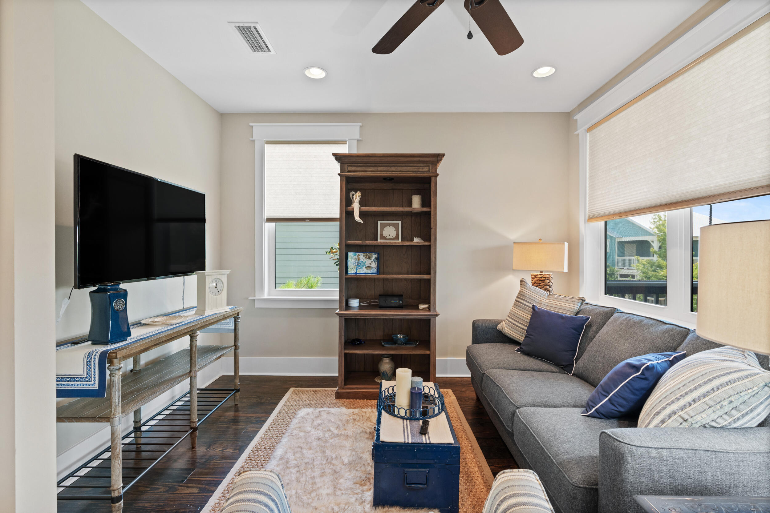 694 Flatwoods Forest Loop Santa Rosa Beach, FL 32459 - Photo 24 of 50 a living room with furniture and a flat screen tv