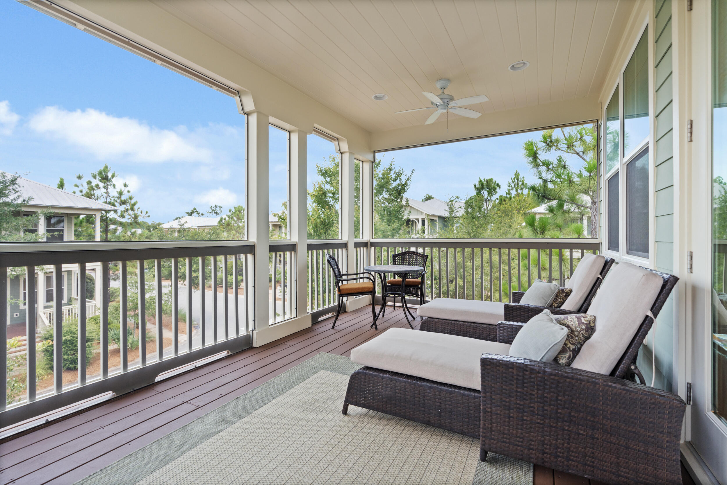 694 Flatwoods Forest Loop Santa Rosa Beach, FL 32459 - Photo 26 of 50 a balcony with couch and city view